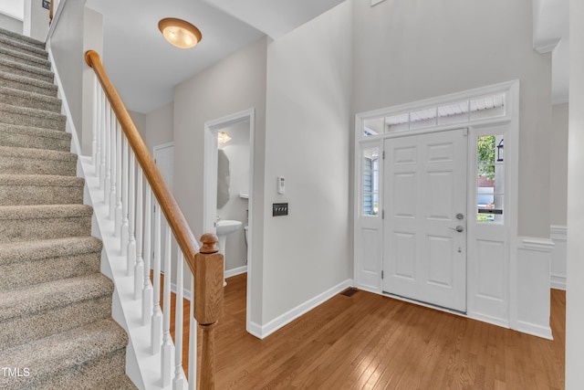 3905 Song Sparrow Dr, Wake Forest, NC 27587 - foyer entrance with wood-type flooring and stairs