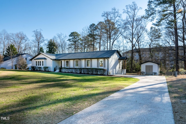 5920 Holly Dr, Raleigh, NC 27616 - ranch-style house with a shed, concrete driveway, a front lawn, and a garage