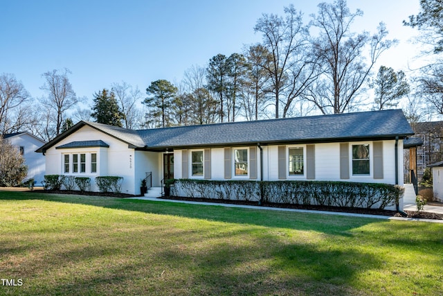 5920 Holly Dr, Raleigh, NC 27616 - ranch-style house with a front lawn and a shingled roof