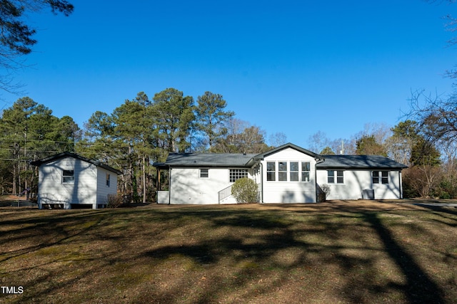 5920 Holly Dr, Raleigh, NC 27616 - ranch-style home featuring a front lawn
