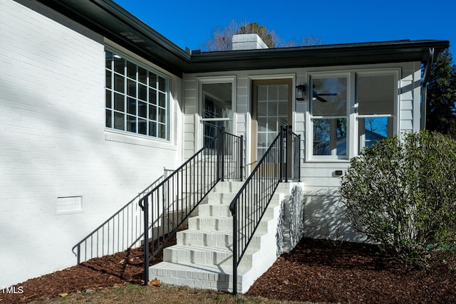 5920 Holly Dr, Raleigh, NC 27616 - doorway to property featuring a chimney and crawl space