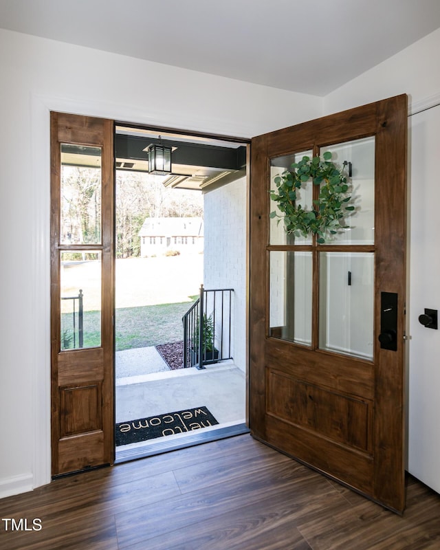5920 Holly Dr, Raleigh, NC 27616 - entrance foyer featuring wood finished floors and a chandelier