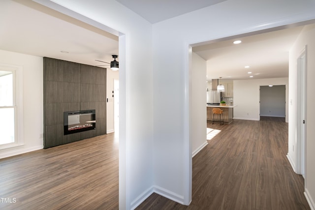 5920 Holly Dr, Raleigh, NC 27616 - hallway featuring dark wood finished floors and recessed lighting