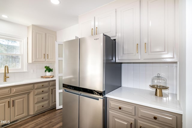 5920 Holly Dr, Raleigh, NC 27616 - kitchen with freestanding refrigerator, tasteful backsplash, light countertops, recessed lighting, and dark wood-style floors