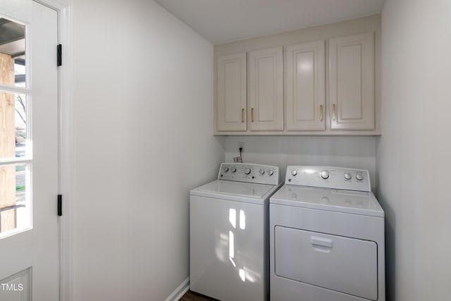 5920 Holly Dr, Raleigh, NC 27616 - laundry area featuring washer and dryer and cabinet space