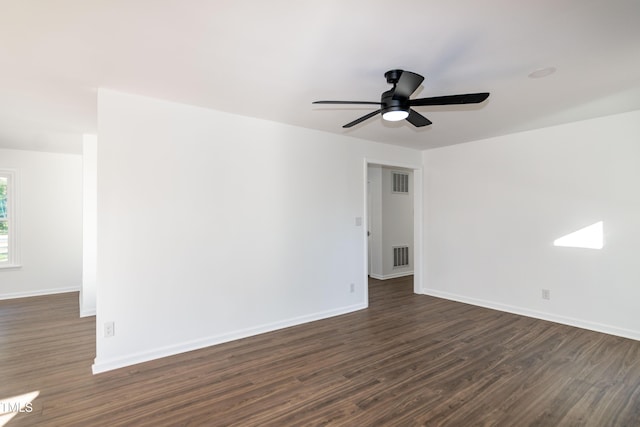 5920 Holly Dr, Raleigh, NC 27616 - spare room featuring dark wood-type flooring and a ceiling fan