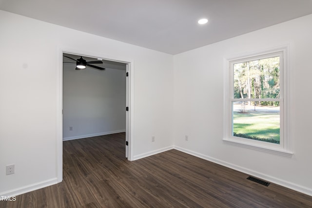 5920 Holly Dr, Raleigh, NC 27616 - empty room featuring dark wood-type flooring and recessed lighting