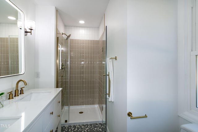 5920 Holly Dr, Raleigh, NC 27616 - bathroom with a shower stall, vanity, and recessed lighting