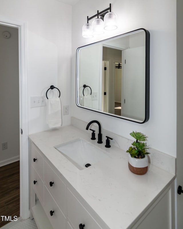 5920 Holly Dr, Raleigh, NC 27616 - bathroom featuring vanity and wood finished floors