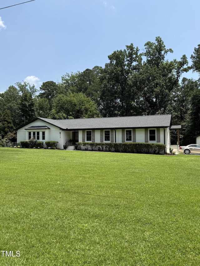5920 Holly Dr, Raleigh, NC 27616 - ranch-style house featuring a front yard