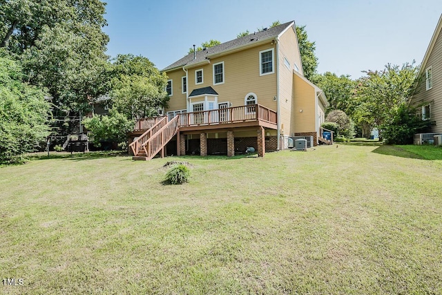 2054 Carriage Way, Chapel Hill, NC 27517 - back of house with stairway, a deck, and a lawn