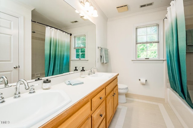 2054 Carriage Way, Chapel Hill, NC 27517 - bathroom with ornamental molding, double vanity, shower / bath combo with shower curtain, and tile patterned flooring