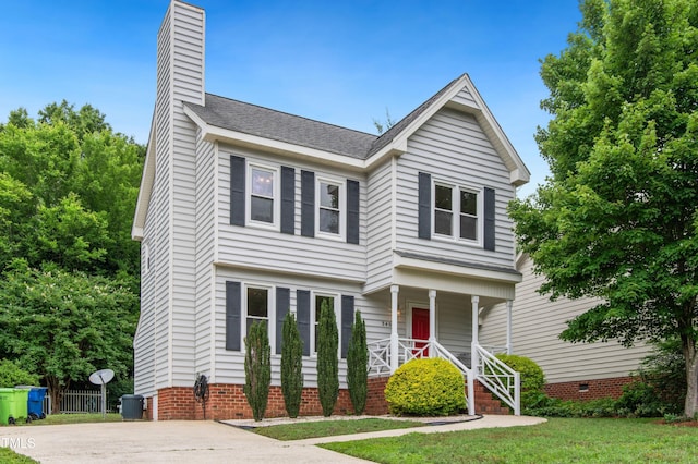 3405 E Jameson Rd, Raleigh, NC 27604 - view of front of house featuring a chimney, a porch, and crawl space