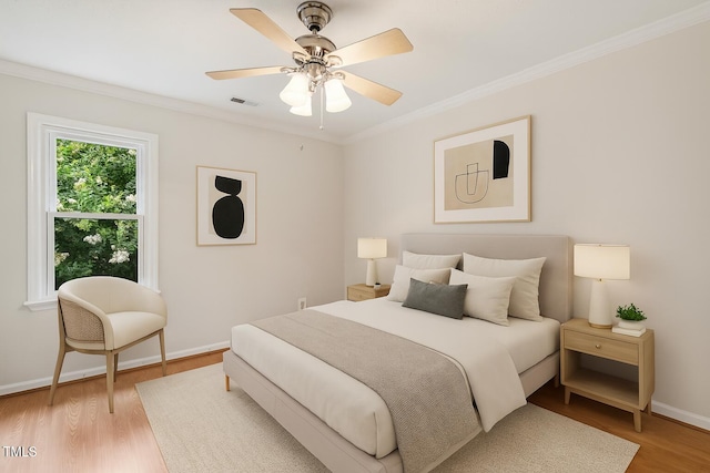 3405 E Jameson Rd, Raleigh, NC 27604 - bedroom featuring ornamental molding, light wood-style flooring, and a ceiling fan