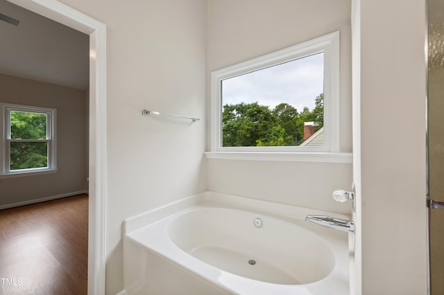 3405 E Jameson Rd, Raleigh, NC 27604 - full bath with a garden tub and wood finished floors