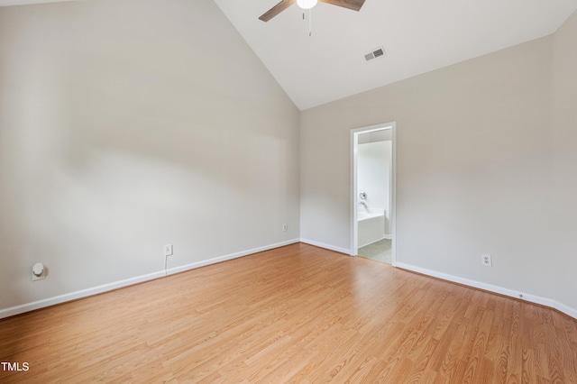 3405 E Jameson Rd, Raleigh, NC 27604 - spare room with ceiling fan, wood finished floors, and high vaulted ceiling