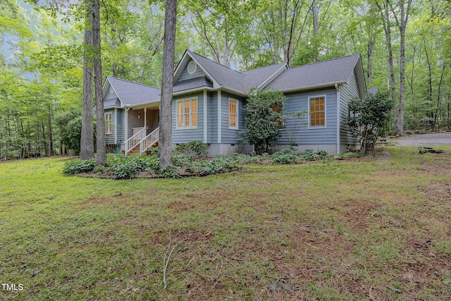 23 Lauren Ct, Pittsboro, NC 27312 - view of side of home featuring a lawn and a porch