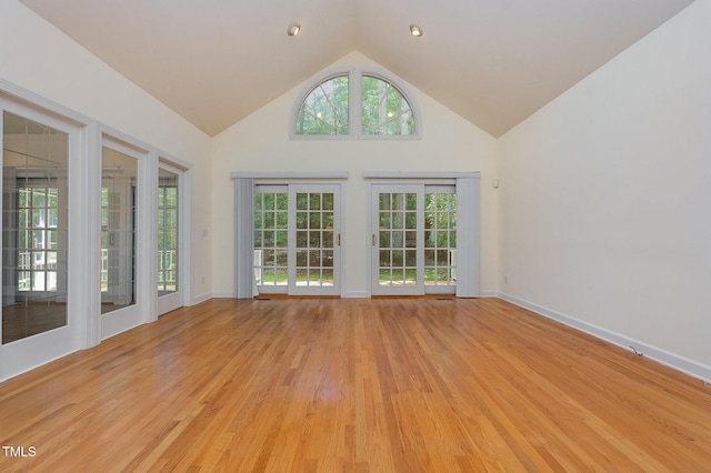 23 Lauren Ct, Pittsboro, NC 27312 - unfurnished room featuring light wood-type flooring and high vaulted ceiling