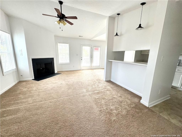 208 Waterdown Dr Unit 10, Fayetteville, NC 28314 - unfurnished living room featuring carpet, ceiling fan, a fireplace with flush hearth, and vaulted ceiling