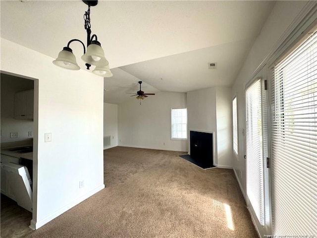 208 Waterdown Dr Unit 10, Fayetteville, NC 28314 - unfurnished living room featuring carpet, lofted ceiling, a ceiling fan, and a chandelier