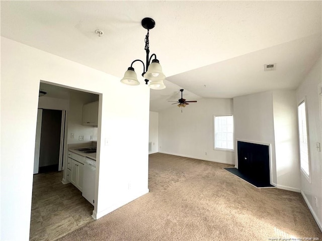 208 Waterdown Dr Unit 10, Fayetteville, NC 28314 - unfurnished living room featuring a chandelier, ceiling fan, light colored carpet, and lofted ceiling