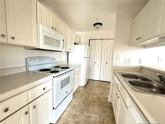 208 Waterdown Dr Unit 10, Fayetteville, NC 28314 - kitchen with white appliances, white cabinets, and light countertops
