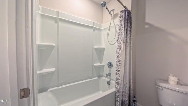 67 Red Cedar Way, Fuquay Varina, NC 27526 - bathroom featuring shower / tub combo with curtain and toilet
