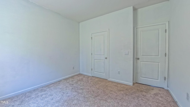 67 Red Cedar Way, Fuquay Varina, NC 27526 - unfurnished bedroom with carpet floors and baseboards