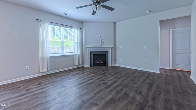67 Red Cedar Way, Fuquay Varina, NC 27526 - unfurnished living room with ceiling fan, a fireplace, and dark wood finished floors