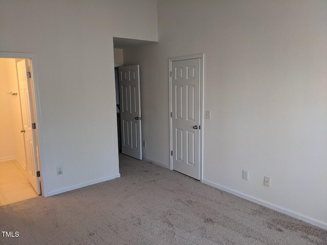8253 City Loft Ct, Raleigh, NC 27613 - unfurnished bedroom featuring carpet flooring and ensuite bathroom