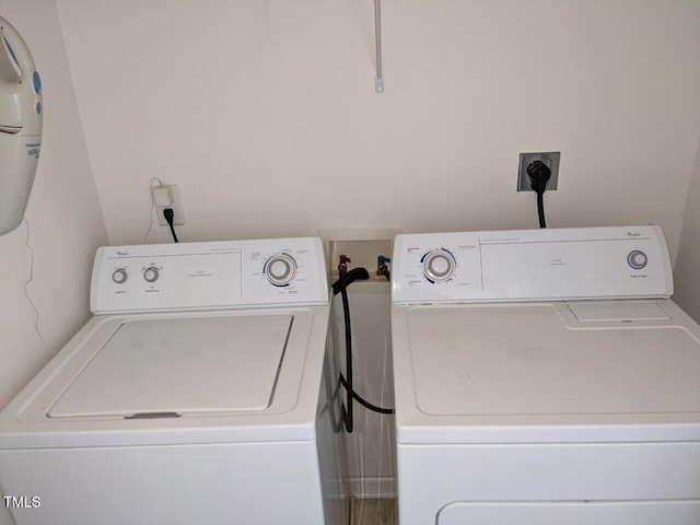 8253 City Loft Ct, Raleigh, NC 27613 - laundry room with washer and clothes dryer