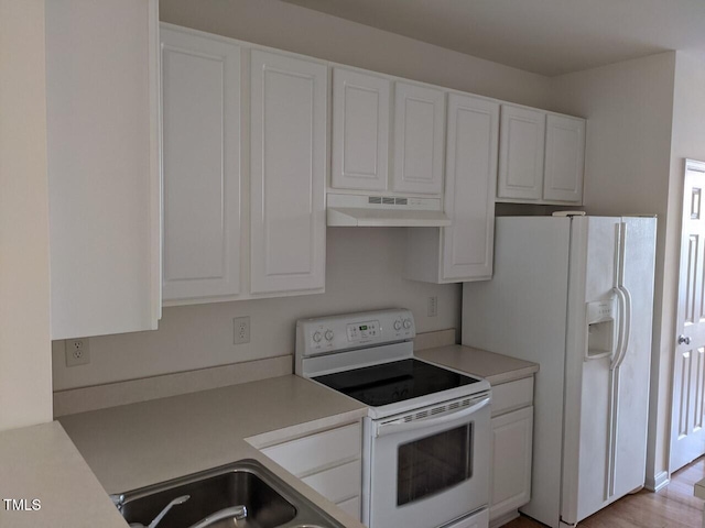 8253 City Loft Ct, Raleigh, NC 27613 - kitchen featuring white appliances, under cabinet range hood, white cabinetry, and light countertops