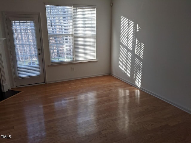 8253 City Loft Ct, Raleigh, NC 27613 - spare room with wood finished floors and baseboards