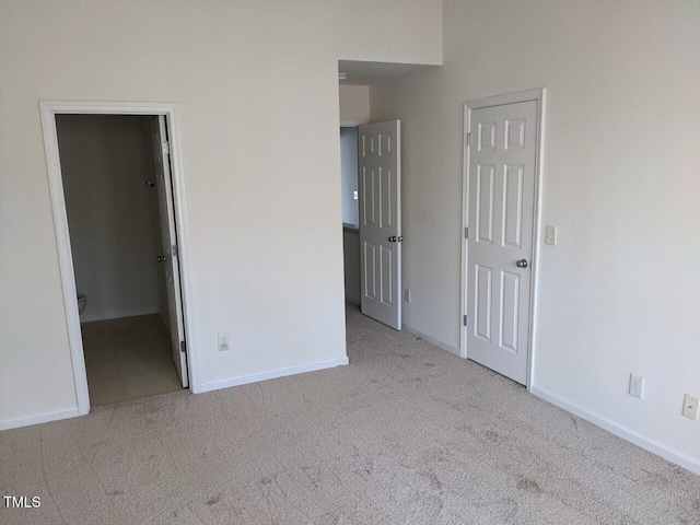 8253 City Loft Ct, Raleigh, NC 27613 - unfurnished bedroom featuring carpet flooring