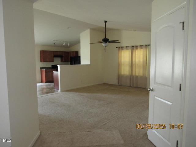 1617 Friendly Rd, Dunn, NC 28334 - spare room with lofted ceiling, light colored carpet, and ceiling fan