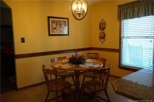 11282 NC Highway 41 N, Lumberton, NC 28358 - dining space featuring a chandelier and baseboards