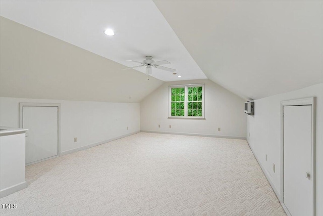 12329 Whartons Way, Raleigh, NC 27613 - additional living space featuring lofted ceiling, ceiling fan, light carpet, a wall unit AC, and recessed lighting