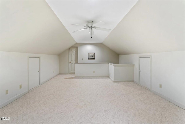 12329 Whartons Way, Raleigh, NC 27613 - additional living space featuring vaulted ceiling, ceiling fan, and light colored carpet