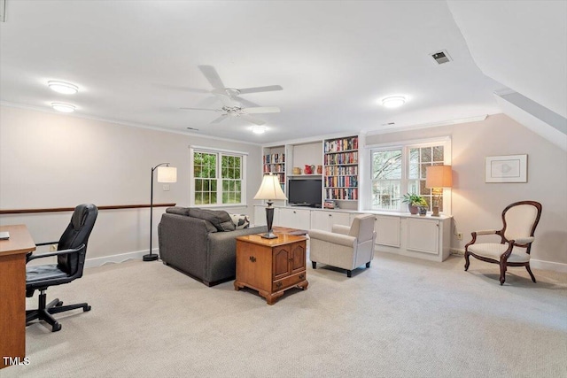 12329 Whartons Way, Raleigh, NC 27613 - living room featuring a desk, light carpet, ornamental molding, and ceiling fan