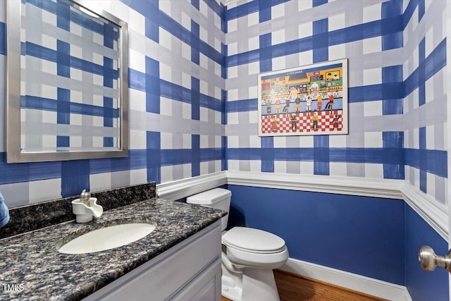 12329 Whartons Way, Raleigh, NC 27613 - half bathroom with vanity and wood finished floors