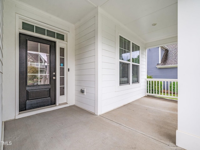 1018 Traditions Ridge Dr, Wake Forest, NC 27587 - view of exterior entry with a porch