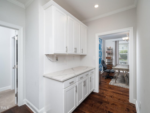 1018 Traditions Ridge Dr, Wake Forest, NC 27587 - kitchen featuring dark wood-style floors, white cabinets, ornamental molding, light stone countertops, and recessed lighting