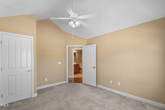336 Faith Dr, Gibsonville, NC 27249 - unfurnished bedroom with vaulted ceiling, light carpet, and a ceiling fan