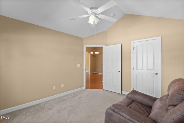336 Faith Dr, Gibsonville, NC 27249 - sitting room with a chandelier, ceiling fan, carpet floors, and high vaulted ceiling