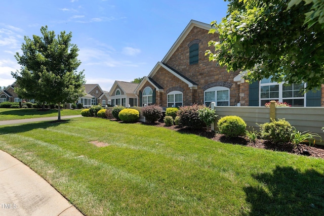 336 Faith Dr, Gibsonville, NC 27249 - view of front of home featuring stone siding