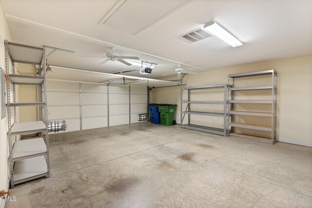 336 Faith Dr, Gibsonville, NC 27249 - garage featuring a garage door opener and ceiling fan