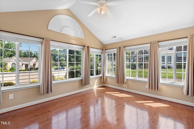 336 Faith Dr, Gibsonville, NC 27249 - unfurnished sunroom with wood finished floors, healthy amount of natural light, and high vaulted ceiling