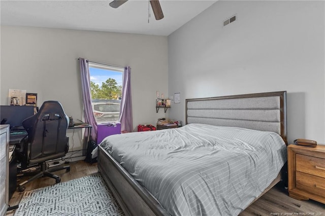 3374 Legion Rd, Hope Mills, NC 28348 - bedroom featuring wood finished floors, a ceiling fan, and an office area
