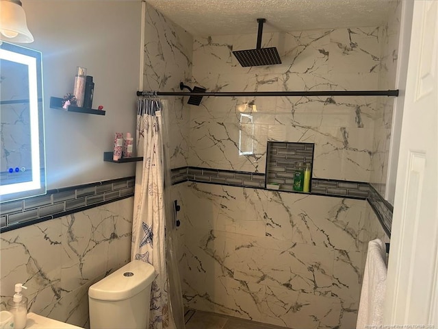 3374 Legion Rd, Hope Mills, NC 28348 - bathroom featuring a marble finish shower, tile walls, and a textured ceiling