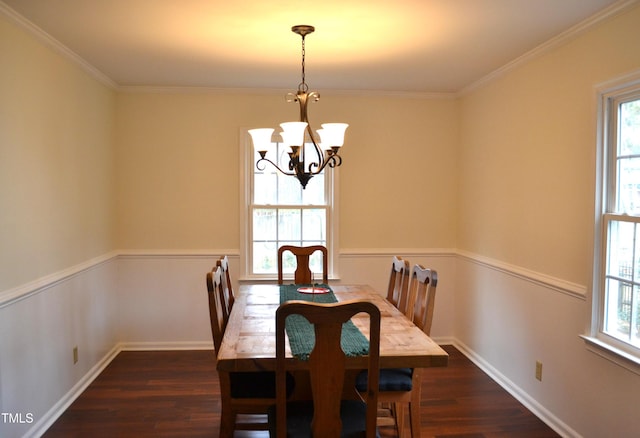138 Dorsey Pl, Henderson, NC 27536 - dining room featuring dark wood-type flooring, plenty of natural light, crown molding, and a chandelier